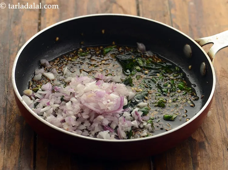 Step 20 – Add the onions.