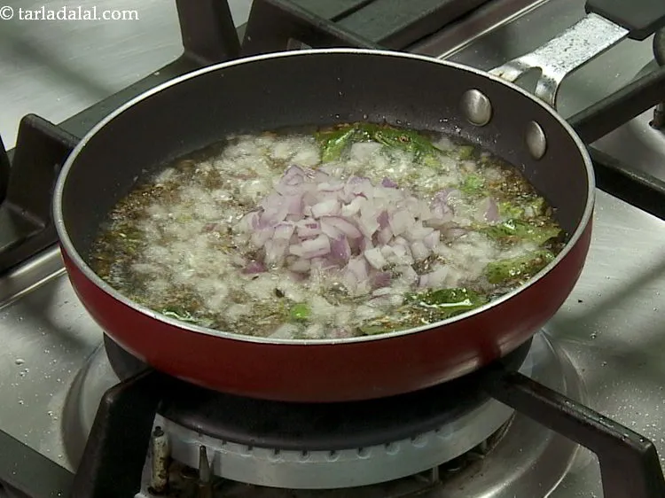Step 20 – Add the onions.