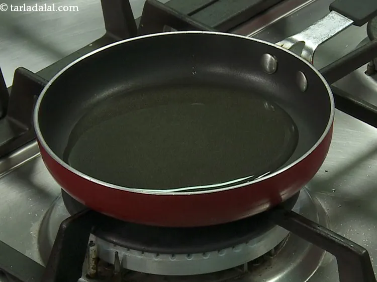 Step 13 – <div> After the batter is fermented, heat the oil in a small non-stick pan.</div> <div> …