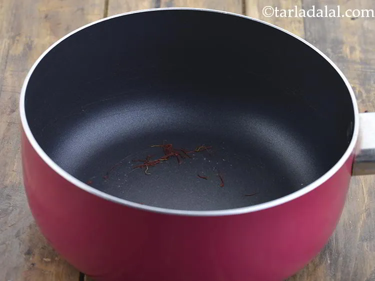 Step 7 – Meanwhile, dry roast the saffron in a saucepan on a medium flame for 30 seconds. …