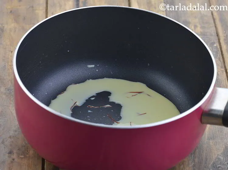 Step 8 – Add 1 tbsp of milk and cook on a medium flame for 1 minute, while …