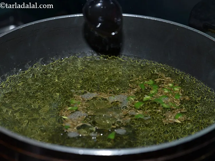 Step 7 – Once the water starts boiling, add the oil.