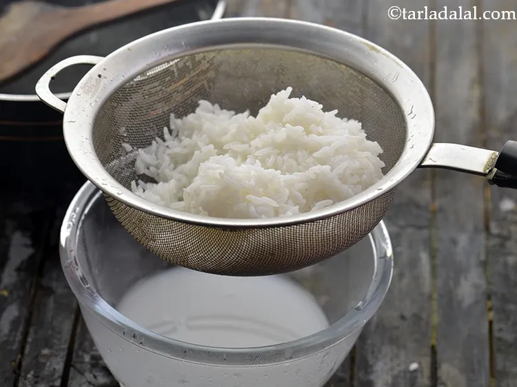 Step 18 – Once the rice is cooked, strain it using a strainer.