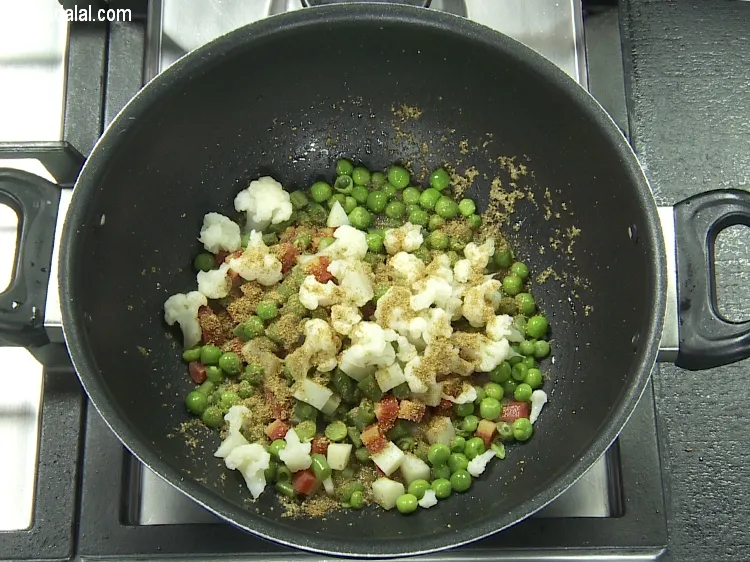 Step 18 – Add&nbsp;1 tsp&nbsp;<a href="https://tarladalal.com/glossary-coriander-cumin-seeds-powder-dhania-jeera-powder-375i">coriander-cumin seeds (dhania-jeera) powder</a>.