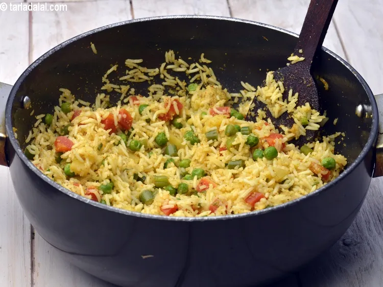 Step 27 – Mix gently and cook on a medium flame for 2 minutes, while stirring occasionally. Ensure …