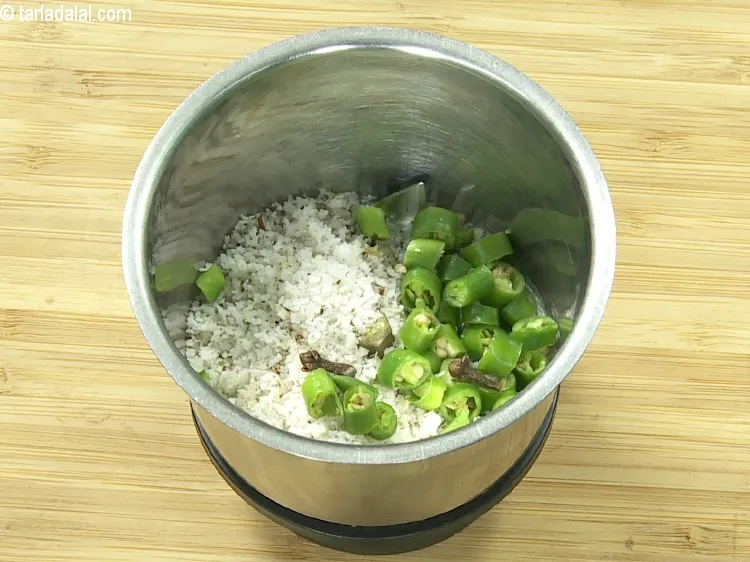 Step 4 – Add&nbsp;2&nbsp;<a href="https://tarladalal.com/glossary-cloves-laung-lavang-322i">cloves (laung / lavang)</a>.