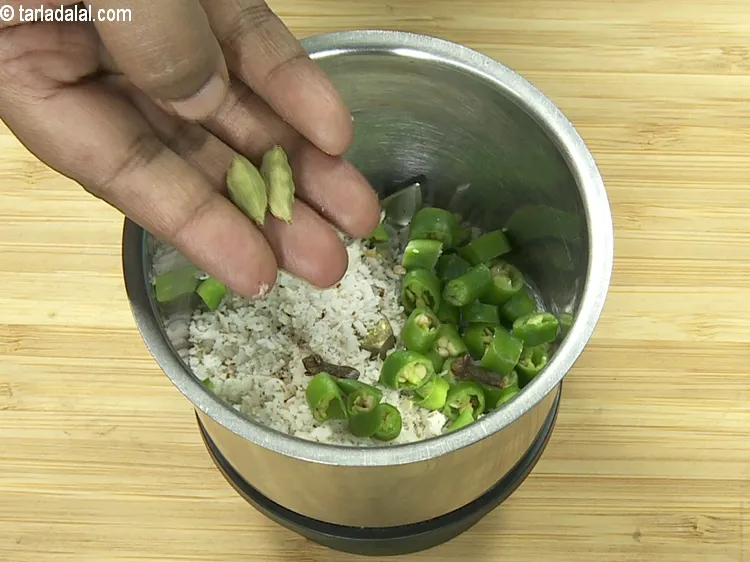 Step 5 – Add&nbsp;2&nbsp;<a href="https://tarladalal.com/glossary-cardamom-elaichi-262i">cardamoms</a>.