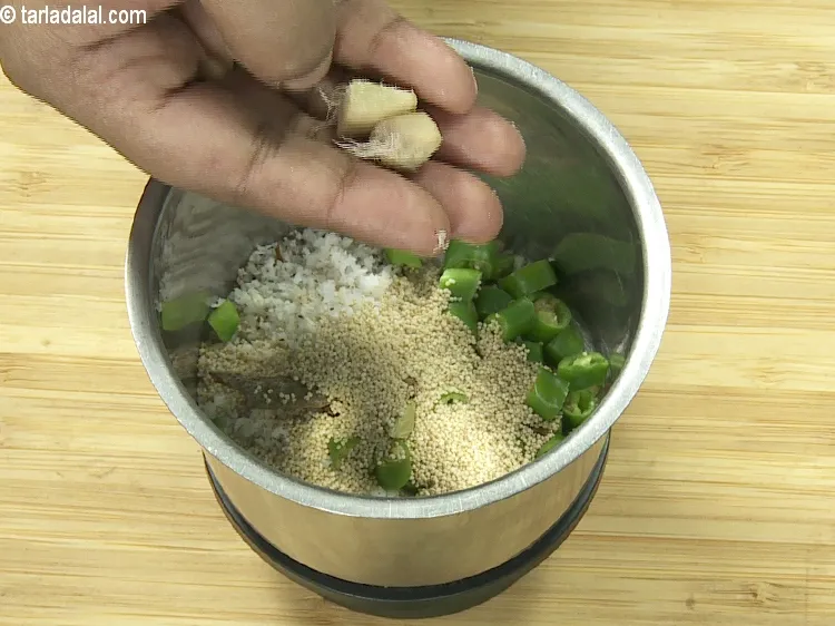 Step 8 – Add&nbsp;1 tsp&nbsp;roughly&nbsp;<a href="https://tarladalal.com/glossary-chopped-ginger-786i">chopped ginger (adrak)</a>.