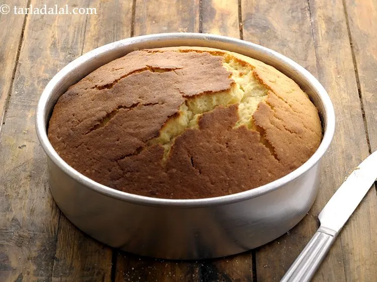 Step 30 – Another test to check if the <strong>vanilla sponge cake</strong> has cooked well or no is …