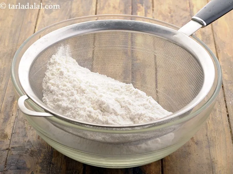 Step 11 – Place the plain flour on the sieve.