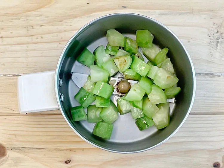 Step 9 – In a mixer add the ridge gourd.