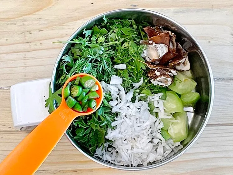 Step 13 – Add&nbsp;<meta charset="UTF-8" />2&nbsp;<a href="glossary-green-chillies-331i">green chillies</a>&nbsp;, roughly chopped.