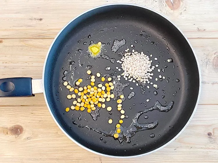 Step 23 – <html><head></head><body><p>Add&nbsp;a pinch of&nbsp;<a href="glossary-asafoetida-hing-113i">asafoetida (hing)</a>.</p></body></html>