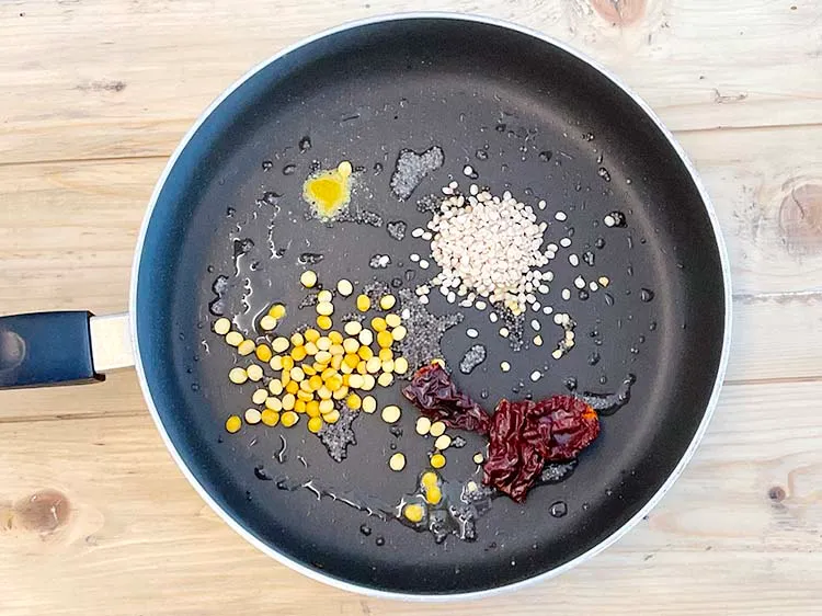 Step 24 – <html><head></head><body><p>Add&nbsp;1&nbsp;<a href="glossary-whole-dry-kashmiri-red-chillies-kashmiri-mirch-kashmiri-lal-mirch-332i">whole dry kashmiri red chilli</a>&nbsp;, broken into pieces.</p></body></html>