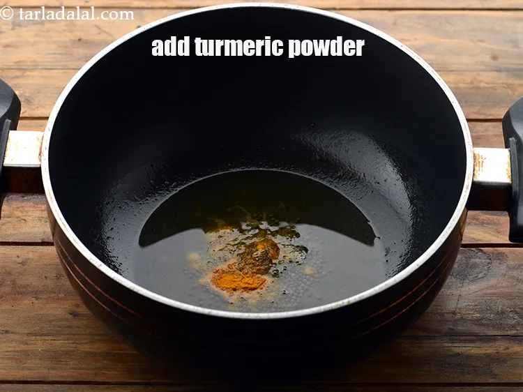 Step 13 – Add&nbsp;1/4 tsp&nbsp;<a href="https://www.tarladalal.com/glossary-turmeric-powder-haldi-645i">turmeric powder (haldi)</a>.&nbsp;