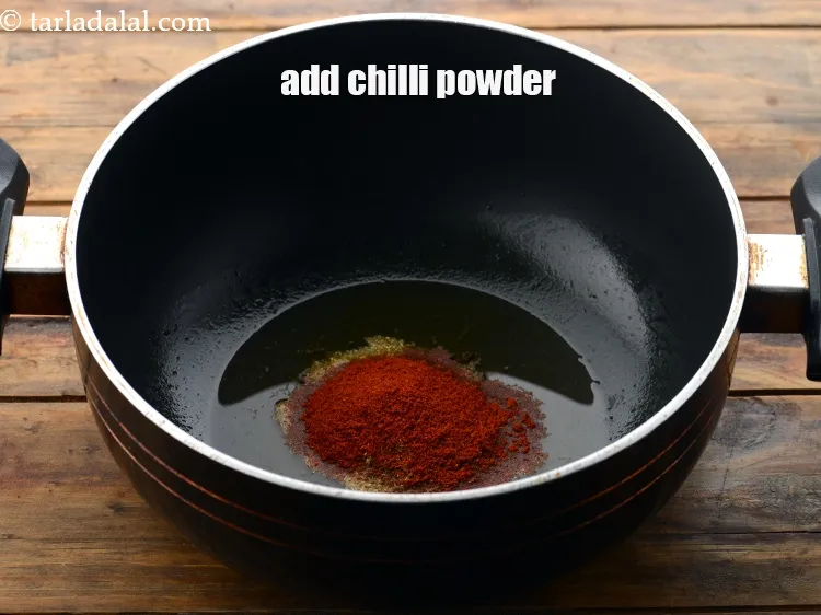 Step 15 – Add 1 tsp&nbsp;<a href="https://www.tarladalal.com/glossary-chilli-powder-red-chilli-powder-339i">chilli powder</a>.&nbsp;