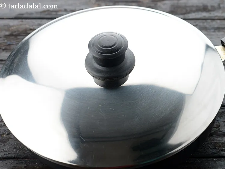 Step 28 – You can cover the pan with a lid and cook as well.&nbsp;