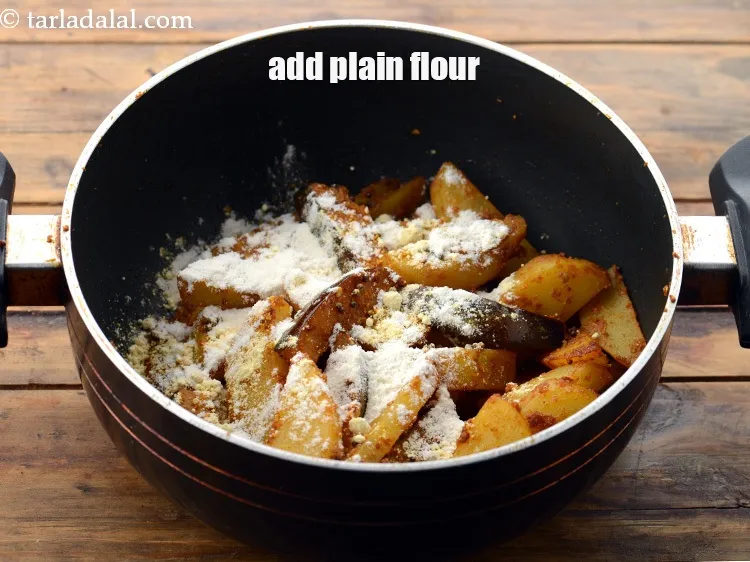Step 22 – Add&nbsp;1/2 tsp&nbsp;<a href="https://www.tarladalal.com/glossary-plain-flour-maida-188i">plain flour (maida)</a>.