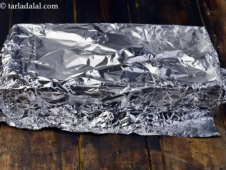 Step 26 – Cover with an aluminium foil and freeze for approx. 10 hours or till the ice …