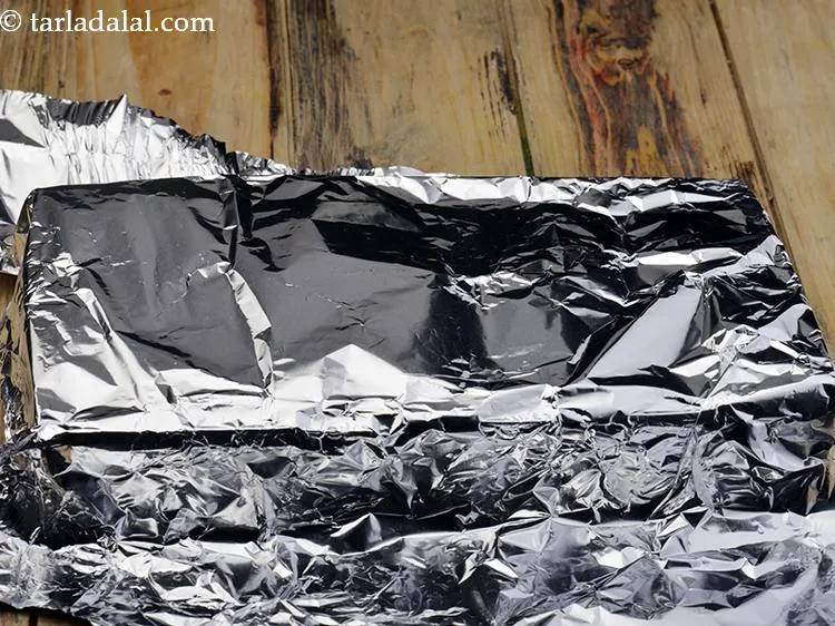 Step 20 – Cover with an aluminium foil and freeze for 6 hours or till semi-set. Ensure that …