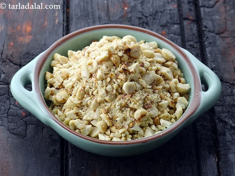 Step 11 – Add 1/4 cup&nbsp;roasted and coarsely&nbsp;<a href="https://www.tarladalal.com/glossary-crushed-raw-peanuts-917i">crushed peanuts</a>. This adds crunch to the<strong> kand stir fry …