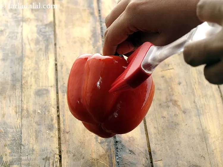 Step 15 – Brush little <a href="https://www.tarladalal.com/glossary-olive-oil-451i">olive oil</a>&nbsp;evenly over it.