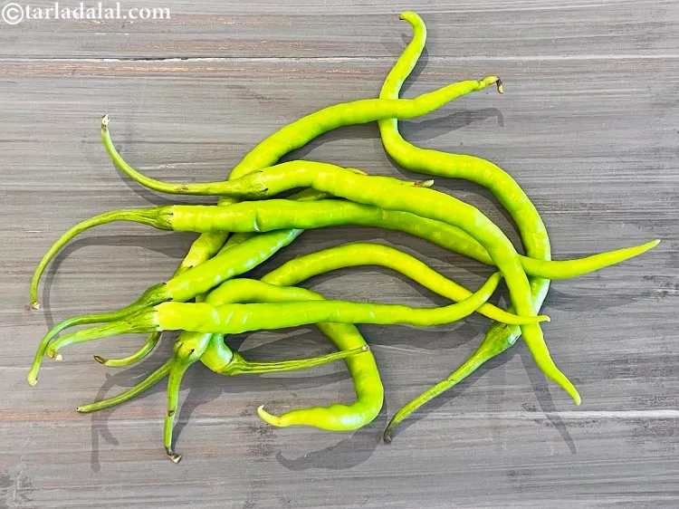 Step 2 – To make<strong> hari mirch fry recipe | Indian mirchi fry | instant green chilli fry …