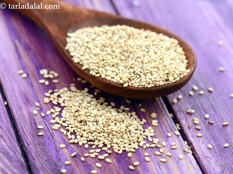 Step 13 – Add 1/2 tbsp&nbsp;<a href="https://www.tarladalal.com/glossary-roasted-sesame-seeds-2271i">roasted sesame seeds (til)</a>.&nbsp;These tiny white seeds are indeed a good source …