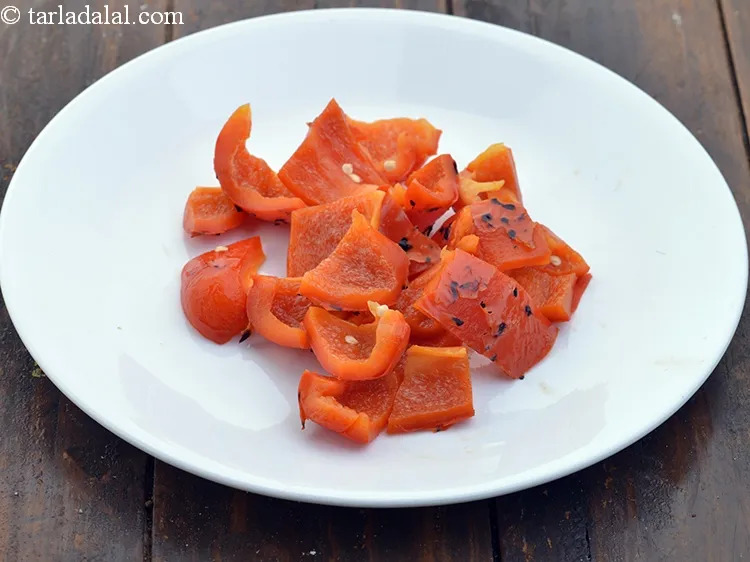 Step 9 – Remove the stems and seeds and chop into big pieces as we are going to …