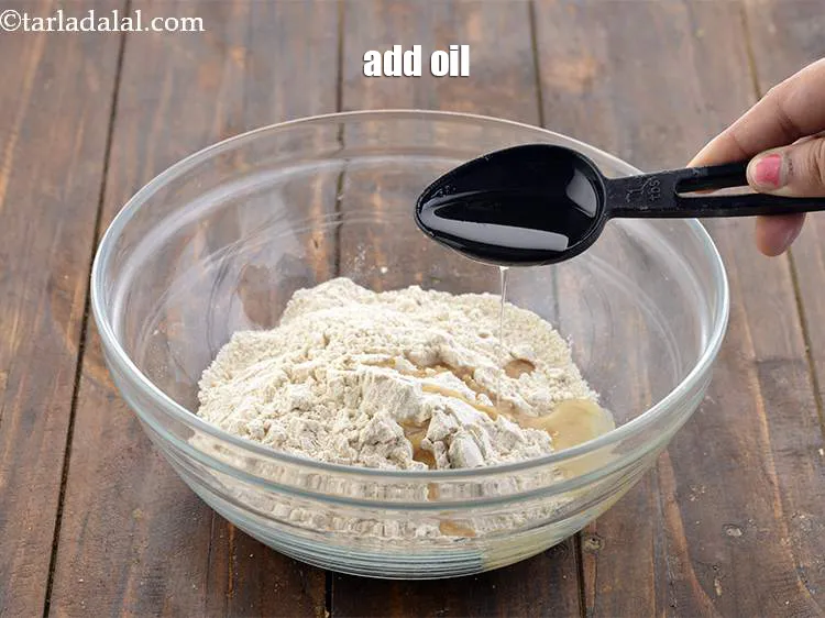 Step 7 – Then add 1&nbsp;tablespoon of oil. Oil helps to bind the flour and also keeps the …