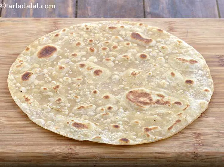 Step 15 – Take the roti (<strong>roti for wraps and rolls)&nbsp;</strong>off the heat and repeat with the remaining …