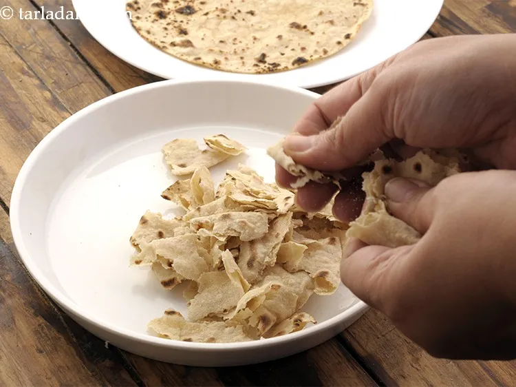 Step 20 – Tear the chapatis into very small pieces to make<strong> roti loadoo for toddlers </strong>and place …