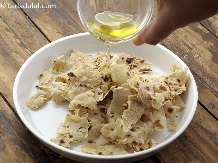Step 21 – Add melted ghee to it. Melting ghee and adding to the chapati pieces is necessary …