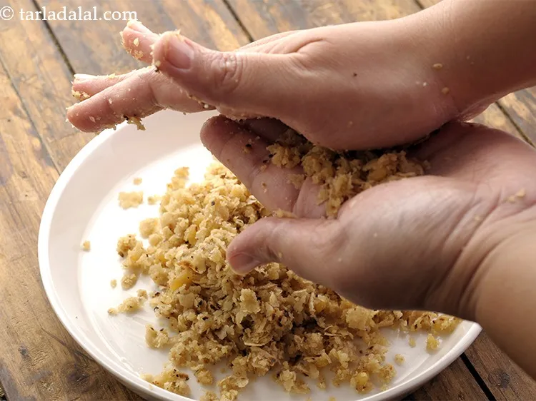 Step 23 – Mix very well in between your palms till the chapatti pieces break into more smaller …