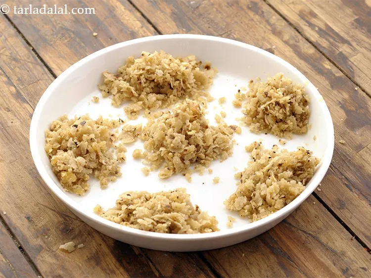 Step 24 – Divide the mixture for chapati ladoo for kids into 6 equal portions.&nbsp;