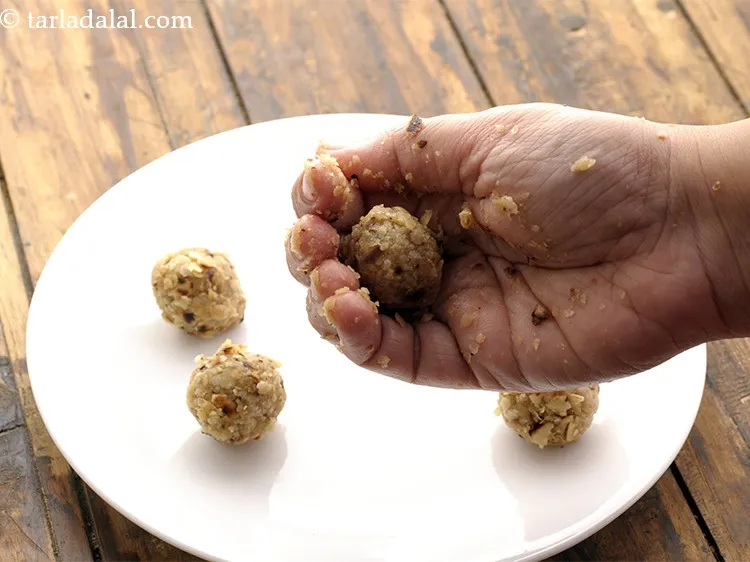 Step 25 – Shape each portion in between your palms into a round ball to make <strong>chapati ladoo …