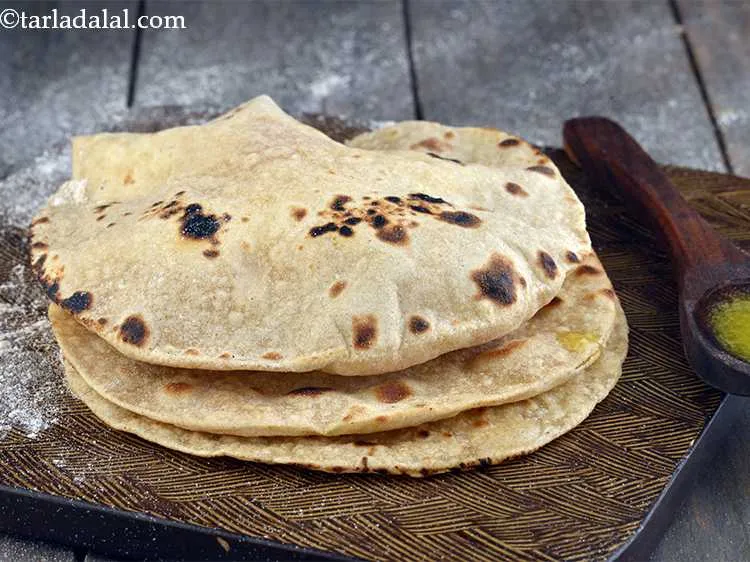 Step 14 – Turn and keep the other side on the flame for 2 second it will puff …