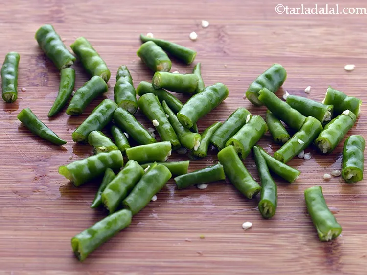 Step 11 – To make paste, add 4&nbsp;<a href="https://www.tarladalal.com/glossary-green-chillies-hari-mirch-331i">green chillies</a>&nbsp;, roughly chopped in a mixer jar. Prefer to …
