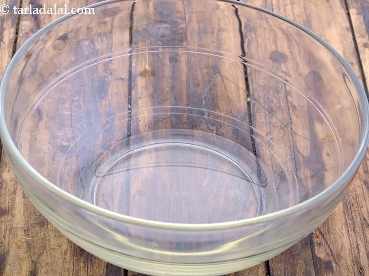 Step 9 – In&nbsp; a microwave safe bowl, take 2 tbsp of oil.