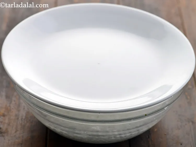 Step 7 – Mix well, cover and keep aside to soak.