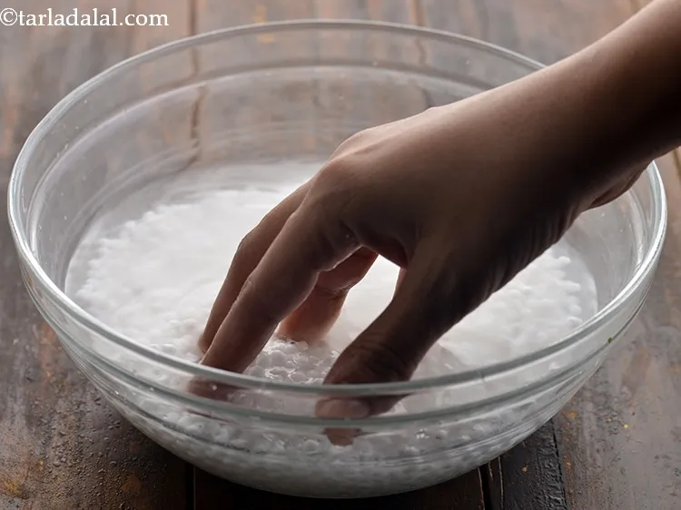 Step 3 – To make the <strong>Maharashtrian style Sabudana Khichdi</strong>, wash the sabudana under running water or in …