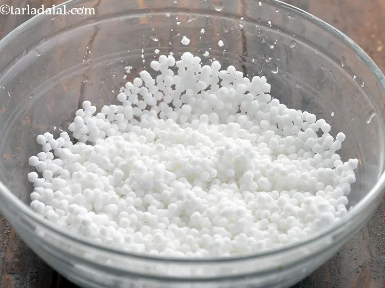 Step 5 – Transfer the washed and drained sabudana in a deep bowl.