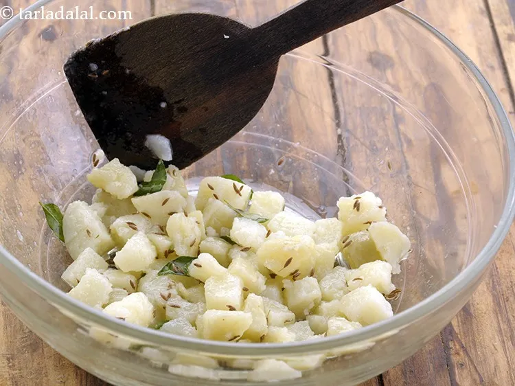 Step 14 – Mix well&nbsp;Microwave on high for 1/2 minute, while tossing it once in between.