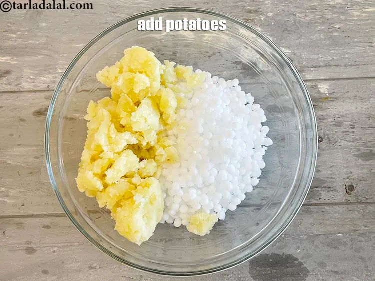 Step 30 – Add 1 cup&nbsp;<a href="https://www.tarladalal.com/glossary-boiled-and-mashed-potatoes-1831i">boiled and mashed potatoes</a>. While adding mashed potatoes, ensure that there is …