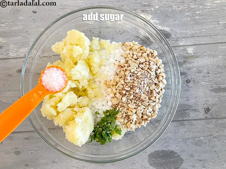 Step 33 – Add&nbsp;1 tbsp&nbsp;<a href="https://www.tarladalal.com/glossary-sugar-chini-shakkar-278i">sugar</a>.