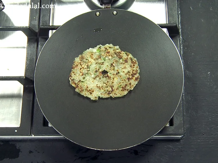 Step 49 – Cook on the other side too till it turns golden brown in colour.