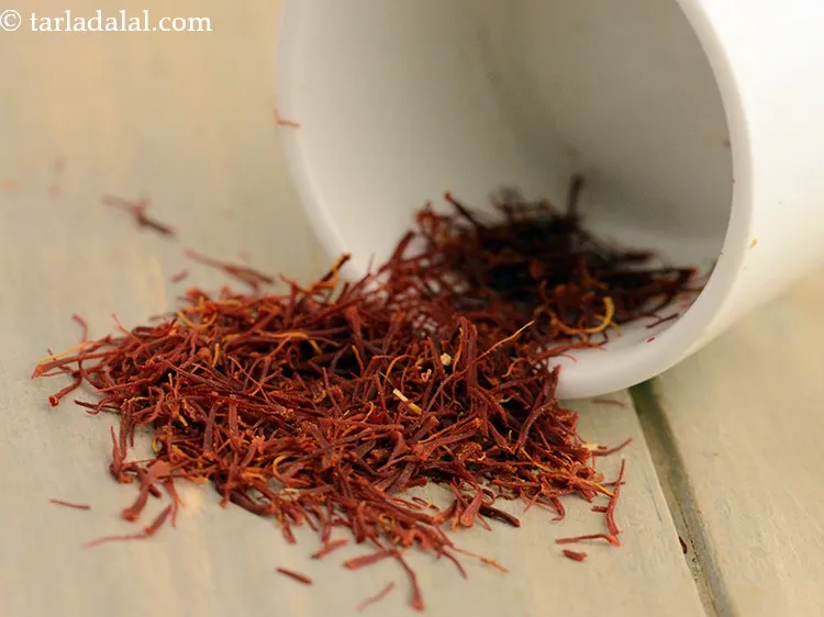 Step 14 – Add a pinch of&nbsp;<a href="https://www.tarladalal.com/glossary-saffron-kesar-520i">saffron (kesar) strands</a>.