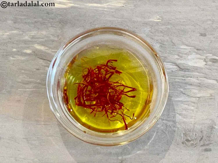 Step 3 – Add 2 tsp of warm water in a small bowl, mix well.