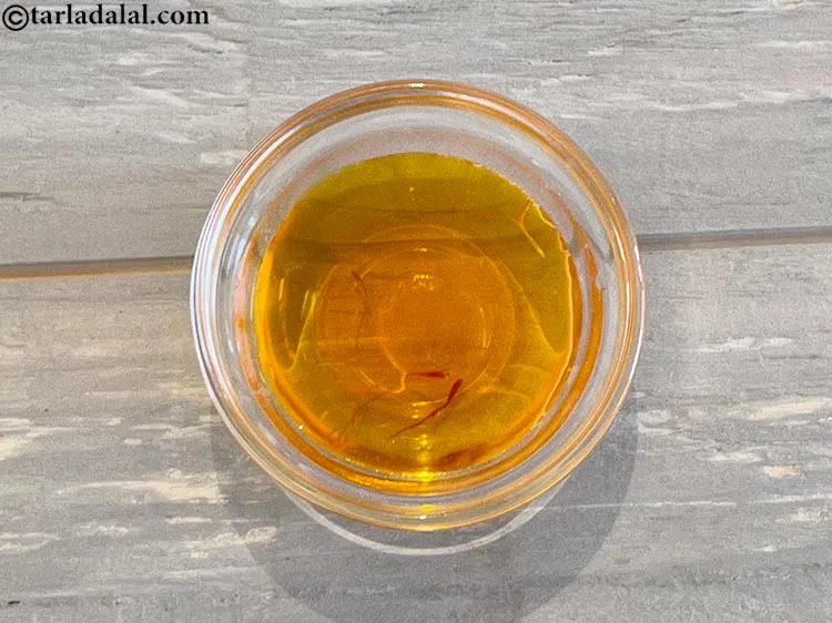 Step 4 – Remove the saffron strands from the saffron mixture.