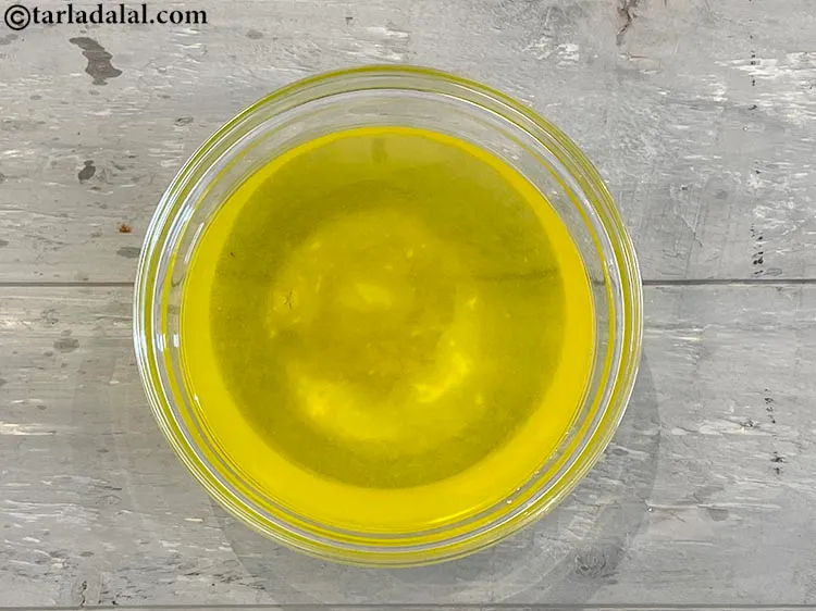 Step 8 – Add the saffron water mixture to the glass bowl. Mix well.